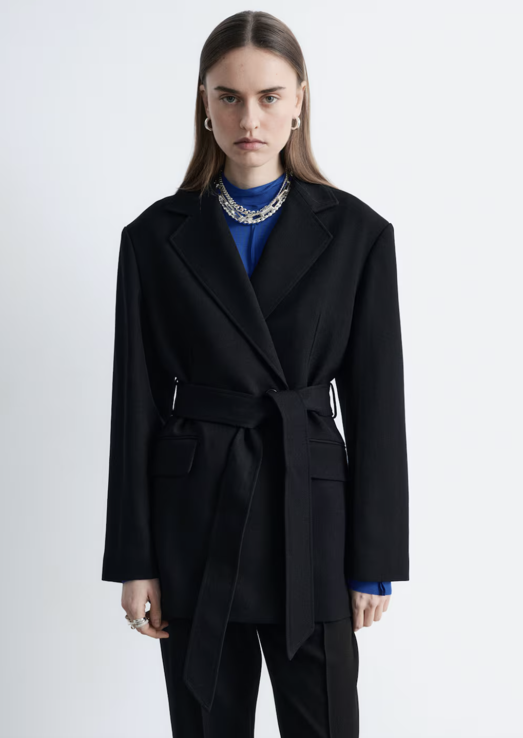 Professional style hack: the & Other Stories Wool Tie-Belt Blazer in black, featuring a cinched waist and structured shoulders to create a designer-inspired hourglass shape.