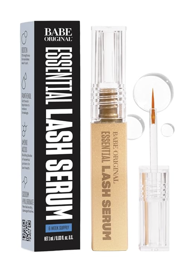 Babe Original Essential Lash Serum gold tube and black packaging box featuring a 6-week supply claim and a built-in fine-tip applicator brush.
