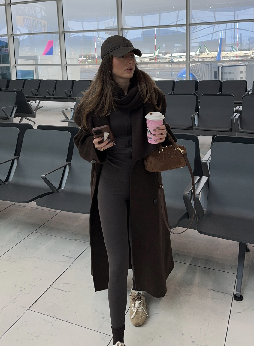 A long chocolate coat with a tonal slim base.