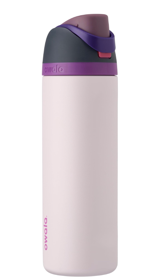 Owala FreeSip 24-ounce water bottle in light pink with a purple and dark grey lid accent.
