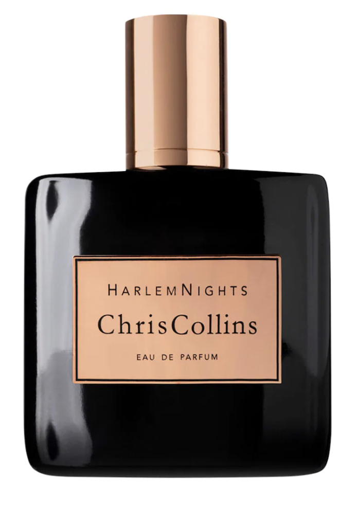 World of Chris Collins Harlem Nights Eau de Parfum in a heavy black glass bottle with a copper label, a seductive and masterfully layered luxury fragrance inspired by the nightlife of the Harlem Renaissance.