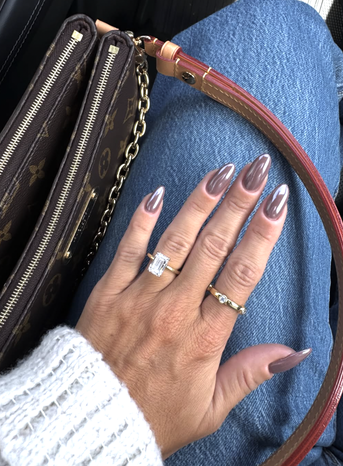 Sheer mocha-colored manicure on short natural nails