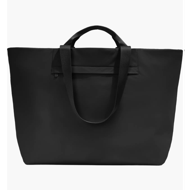 Oversized 42-liter navy blue travel tote with a 16-inch laptop sleeve.