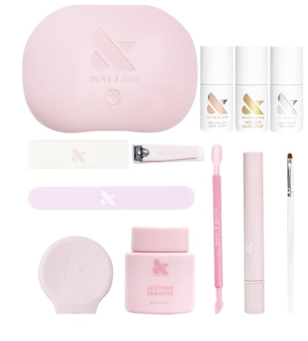 An Olive & June Gel Mani System in a signature pink storage case, featuring a professional LED lamp, polish, cuticle serum, and 'The Poppy' polish handle.
