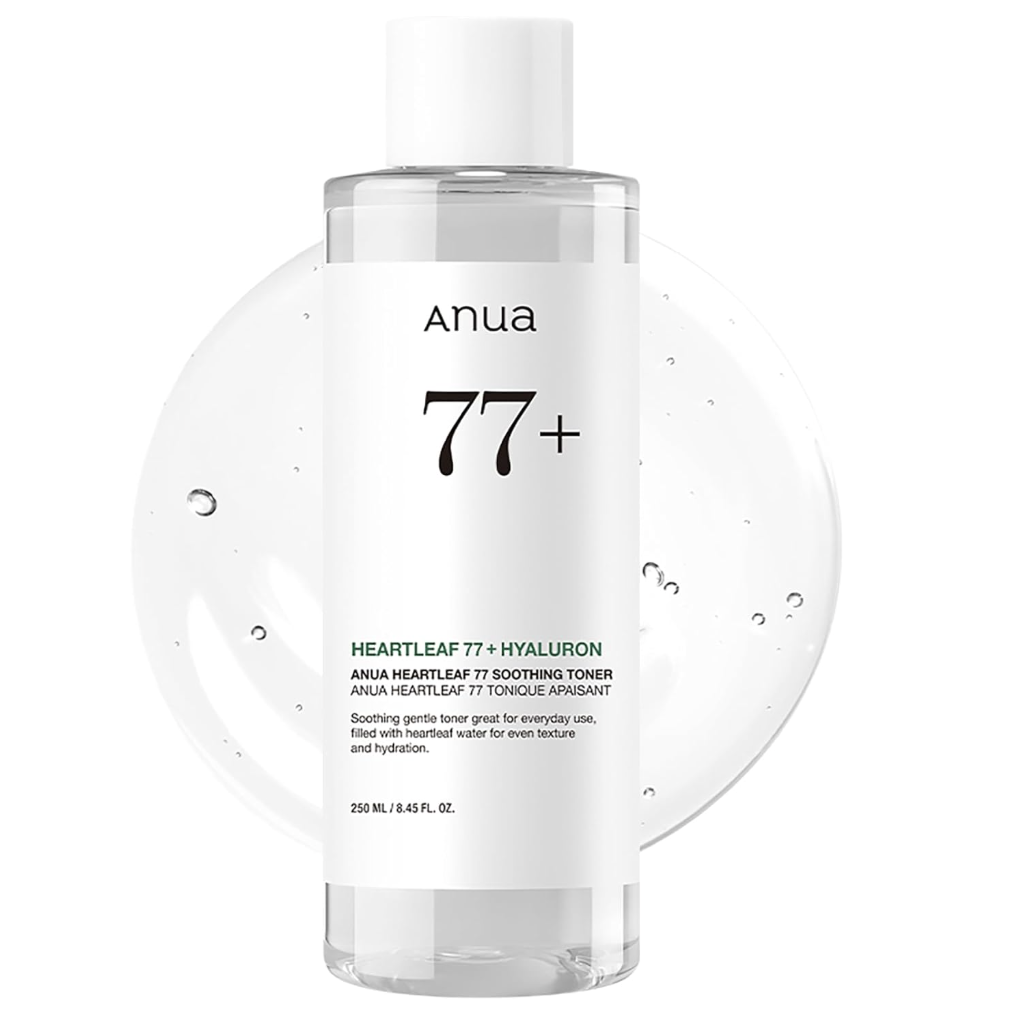 A tall, clear bottle of Anua Heartleaf 77% Soothing Toner with a white cap, featuring minimalist black text and a "77+" graphic, set against a background of clear water droplets.