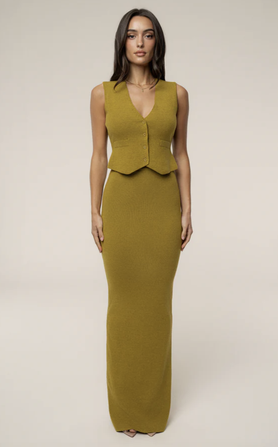 JLUXELabel Moss Cassidy Two Piece Skirt Set in a ribbed knit, featuring a long-sleeve top and matching midi skirt.