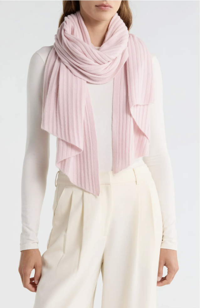 Pink ribbed cashmere travel wrap from Nordstrom on a white background
