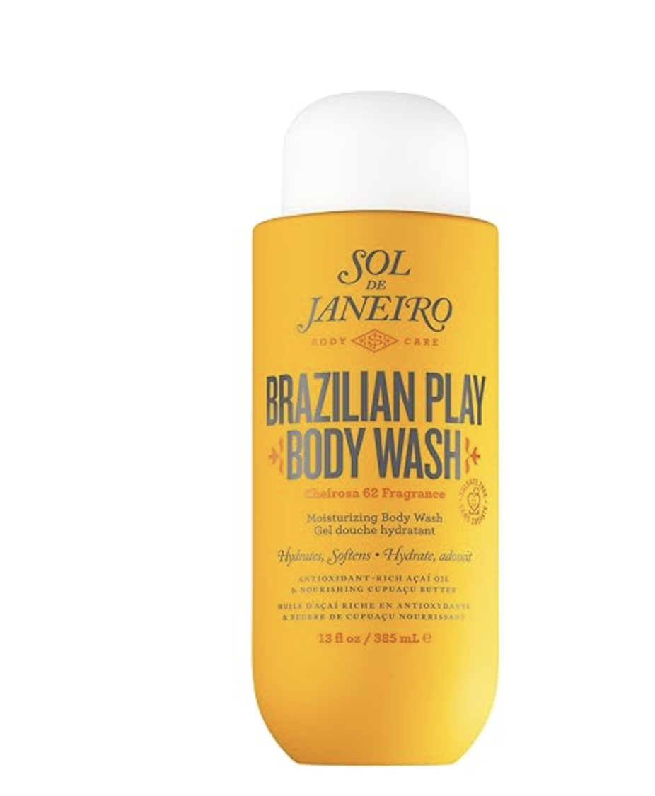 A large yellow bottle of Sol de Janeiro Brazilian Play Moisturizing Body Wash with the Cheirosa 62 fragrance, featuring orange and white text and a white pump top.