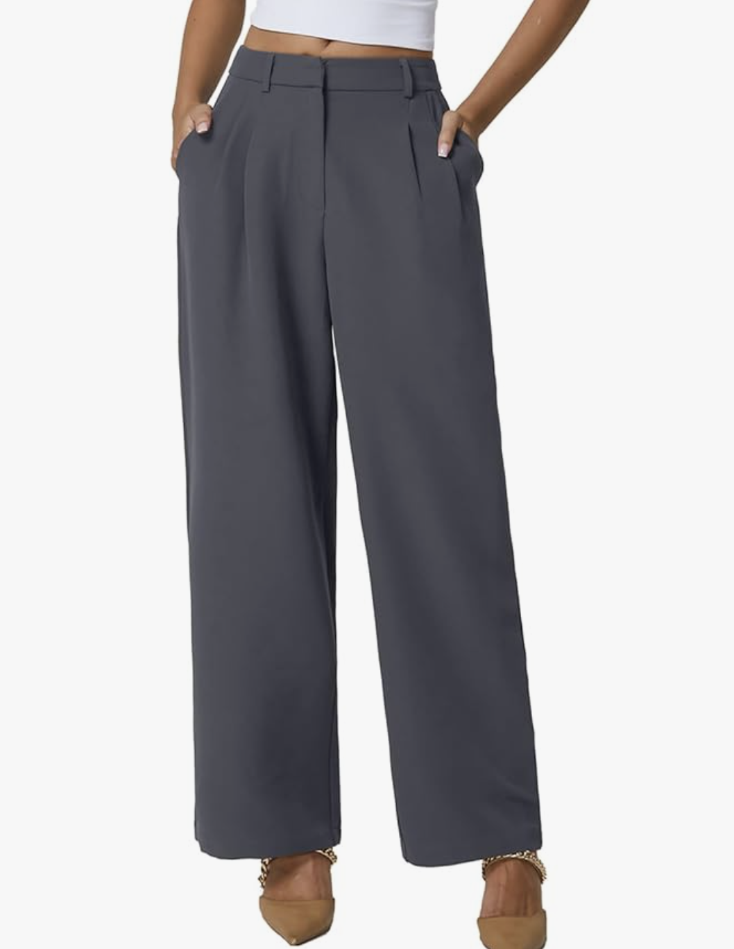 A pair of pro stylist-recommended charcoal grey wide-leg dress pants styled with brown pointed-toe heels, perfect as a foundational piece for the "Skirt Over Pants" layering formula.