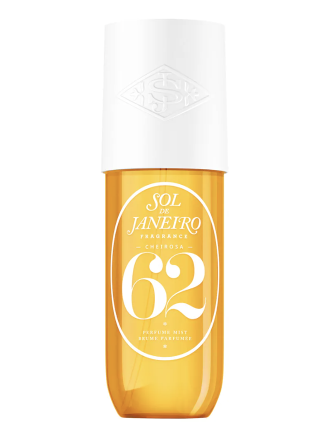 A bottle of Sol de Janeiro Cheirosa 62 Perfume Mist featuring a yellow liquid, a white cap with a decorative pattern, and a large orange "62" on the label.