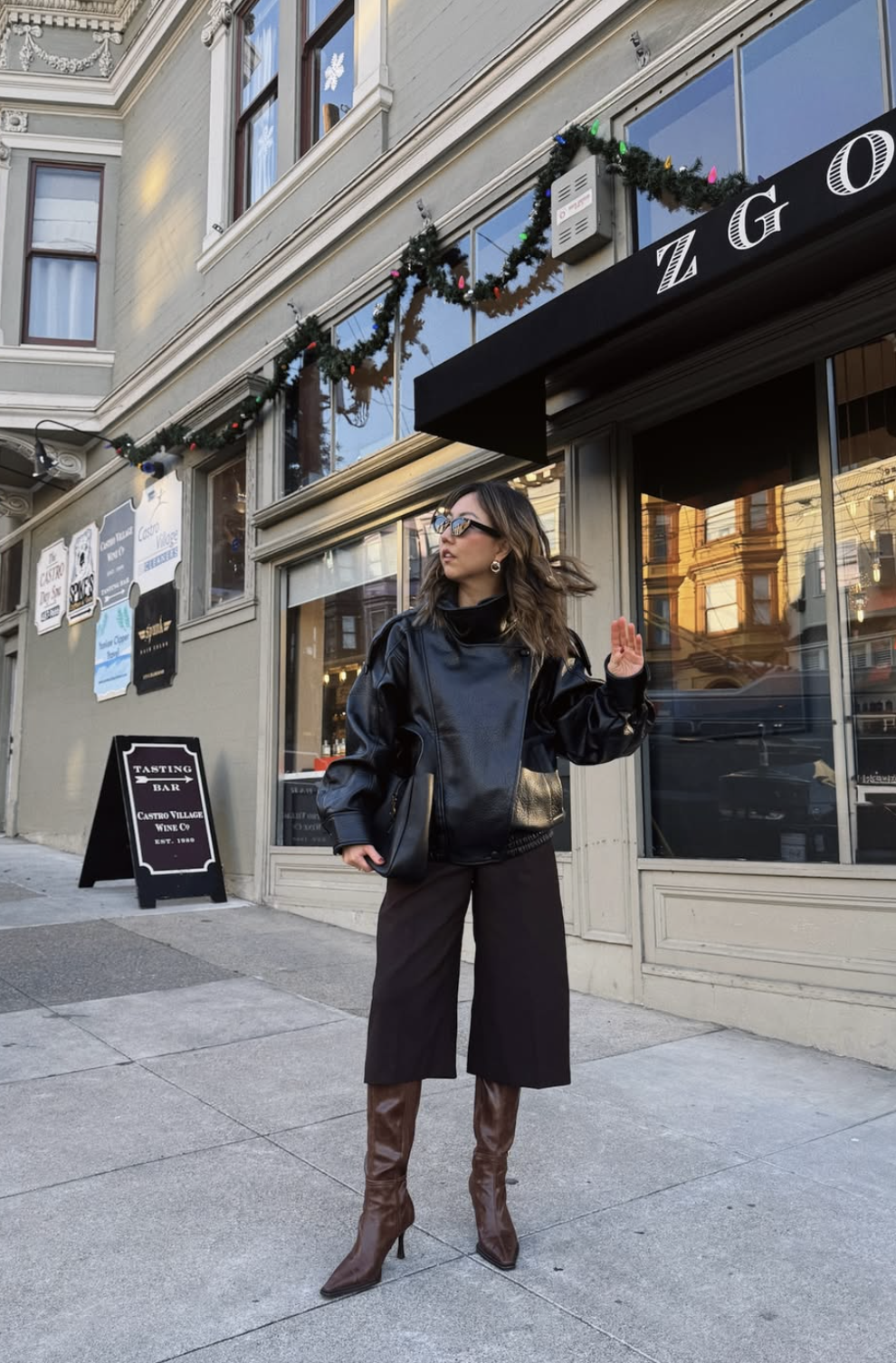 Full-length culottes tall boots office outfit showing the complete boot shaft and shoes