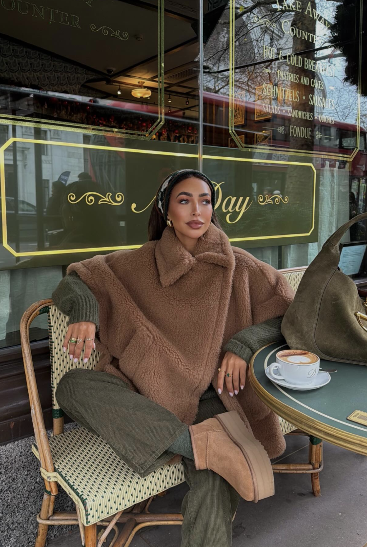 Olive knit separates with a camel teddy-textured layer, chestnut platform boots and an olive handbag.