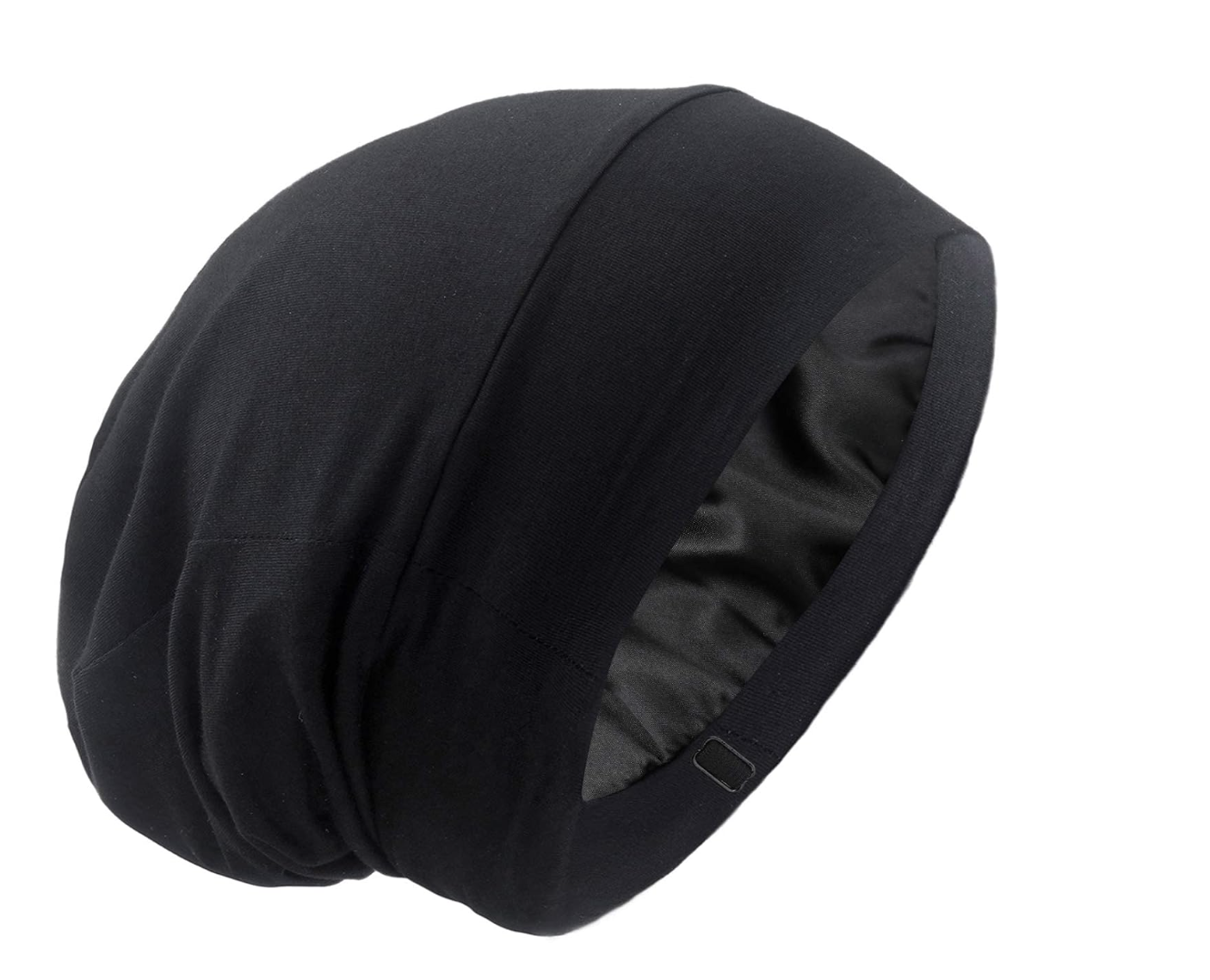 Black slouchy knit bonnet with a black satin lining shown at the open edge.