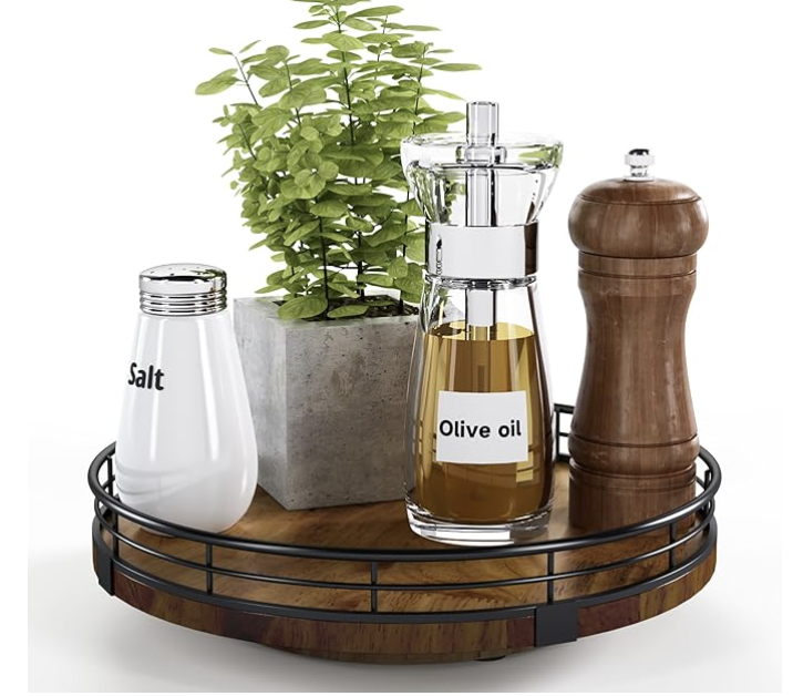 Divided lazy Susan organizing bottles in a kitchen cabinet