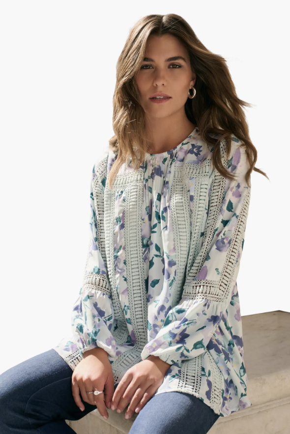 Roaman’s blouse with lace trim and full blouson sleeves.