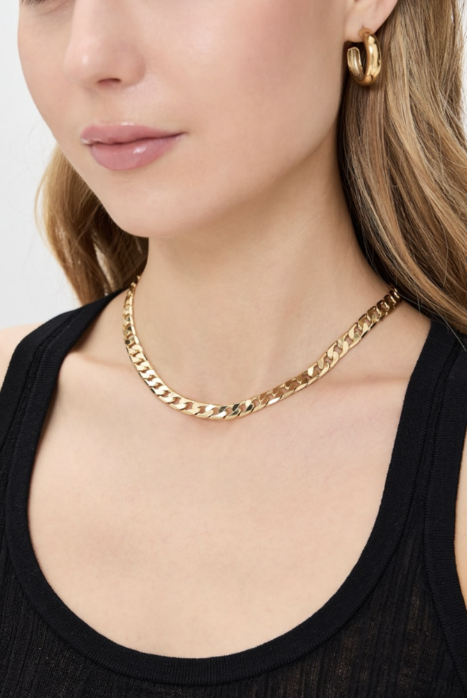 A delicate gold-link chain necklace with a simple, classic design.
