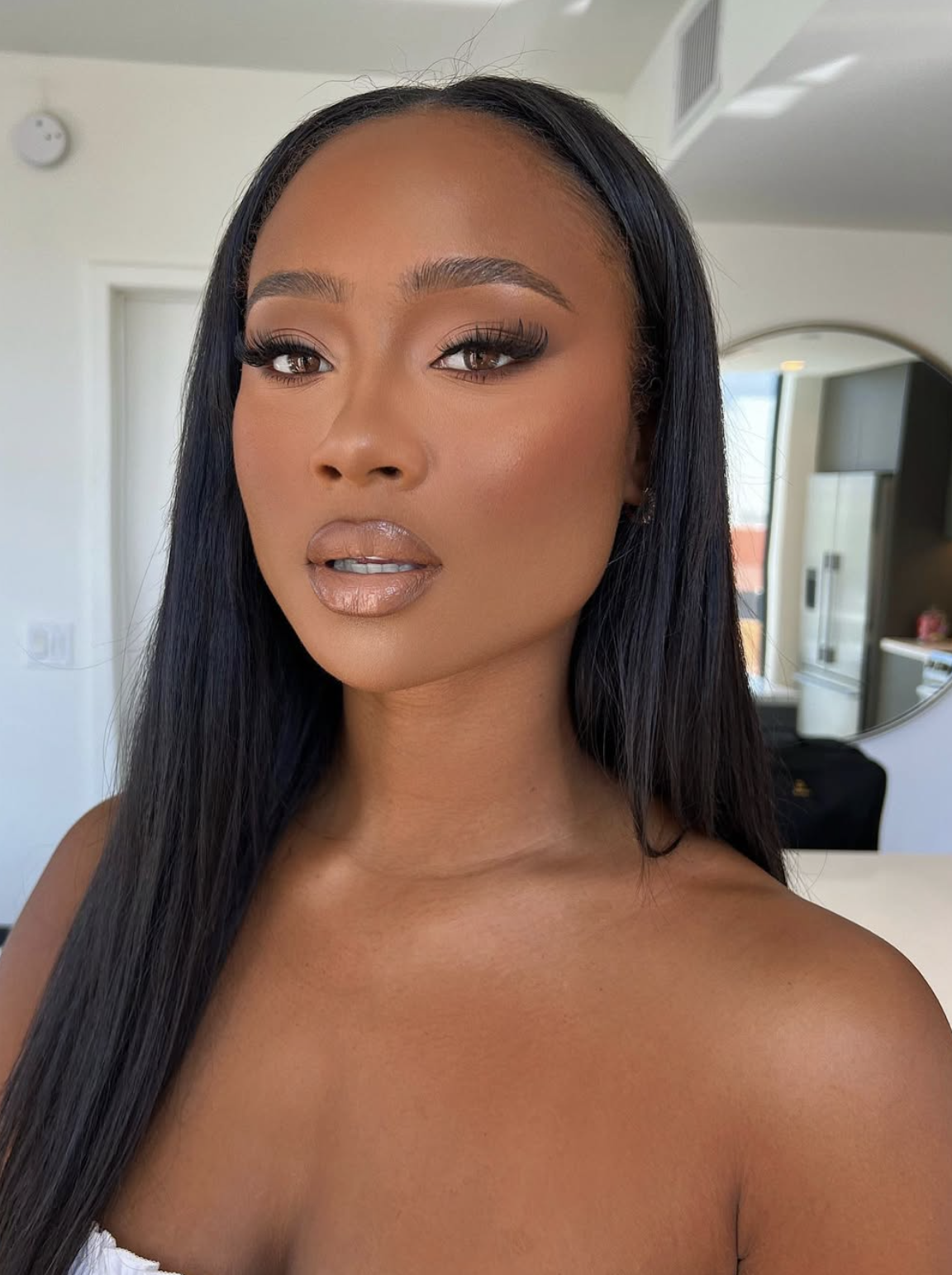 Woman with softly blurred velvet-finish foundation and subtle natural highlights