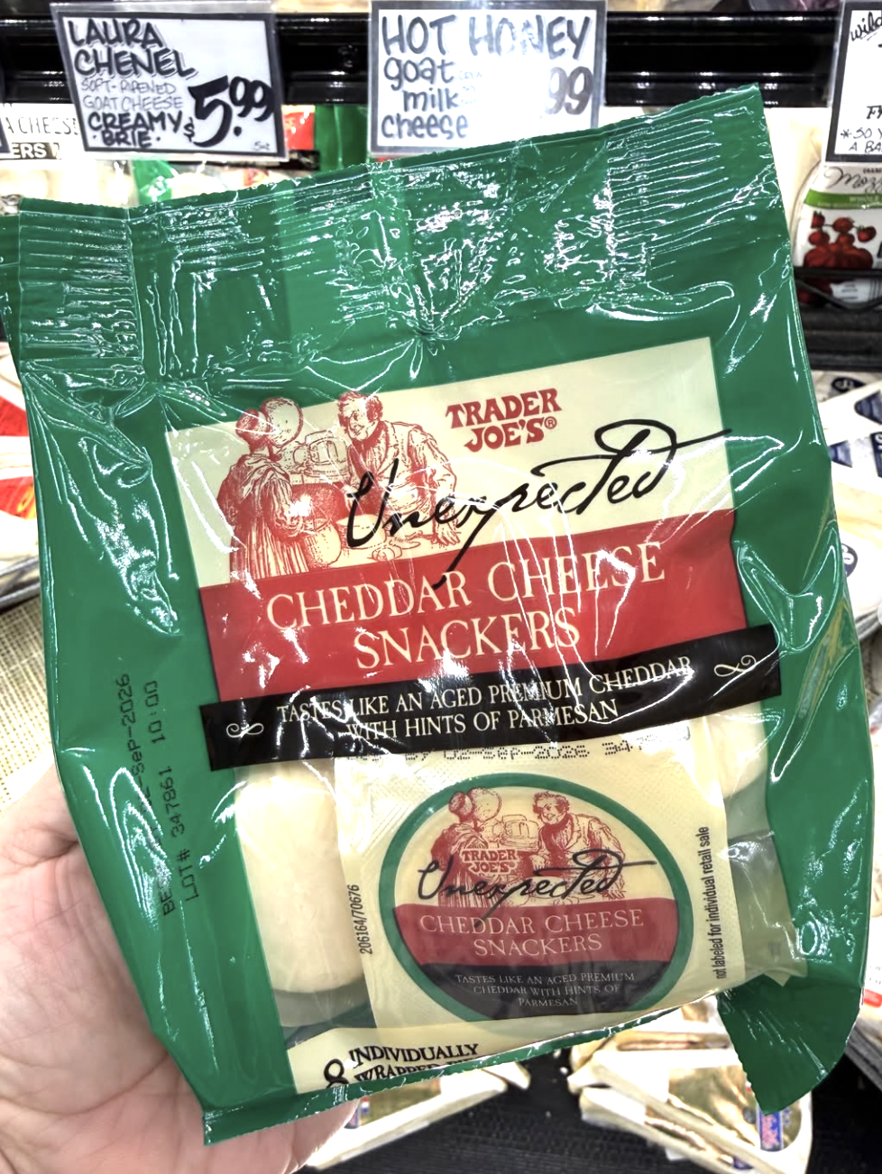 Trader Joe's Unexpected Cheddar with crackers and apple slices