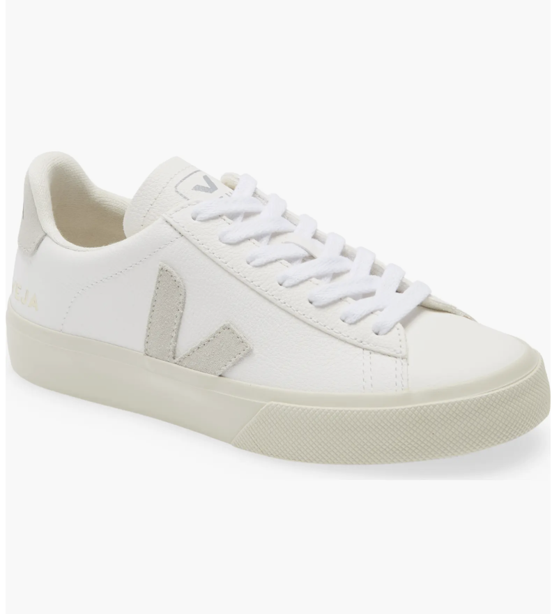 A pair of Veja Campo white leather sneakers with grey suede detailing, styled for a professional business casual outfit.