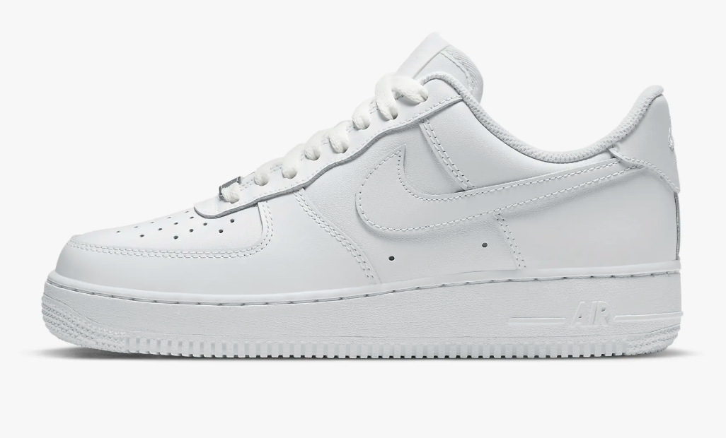 Side profile of a crisp white Nike Air Force 1 '07 women's sneaker, highlighting its iconic leather silhouette and slightly elevated stack height.