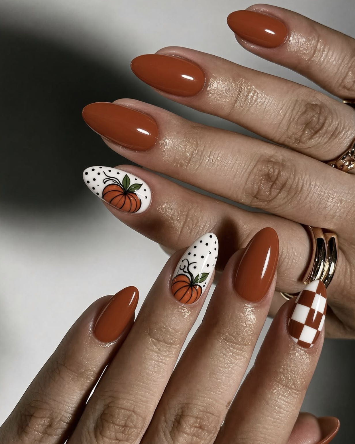Caramel nails with soft burnt orange aura design for Thanksgiving