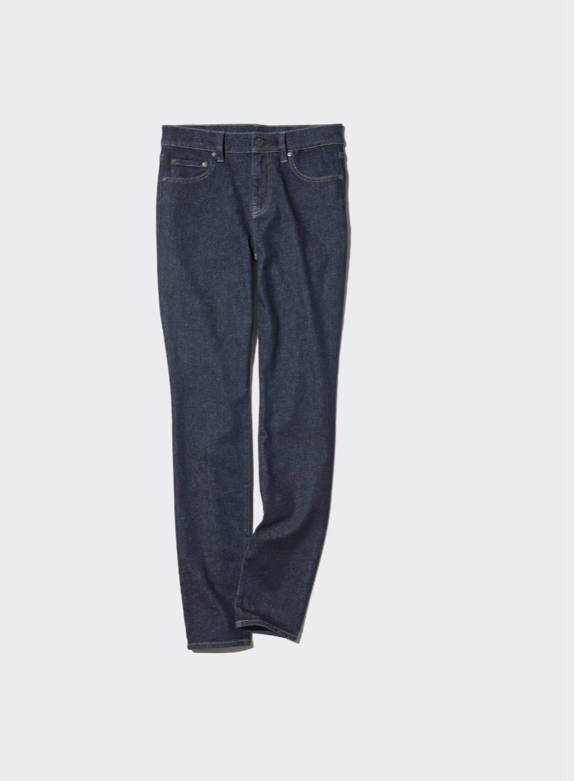 pair of [Uniqlo Ultra Stretch Skinny Jean in a dark indigo wash. These jeans are known for their high-tech stretch fabric and excellent shape recovery, making them a top pick for everyday comfort.