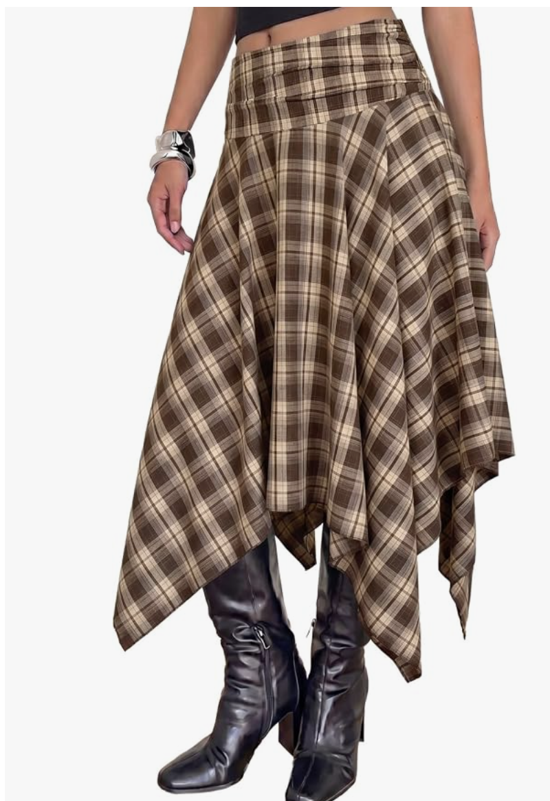 Brown and beige plaid pleated midi skirt with dark boots.