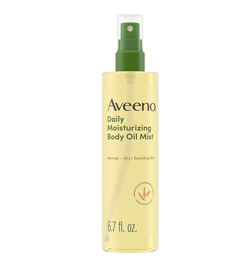 A spray bottle of Aveeno Daily Moisturizing Dry Body Oil Mist with oat and jojoba oil.