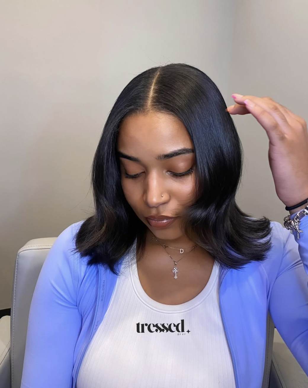 Chin-length silk press bob with outward-flipped ends