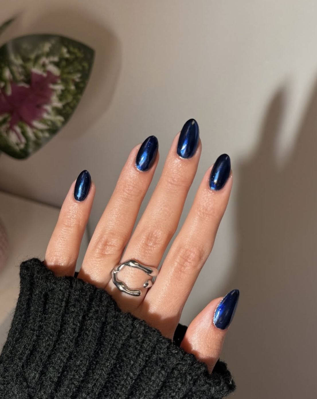 Sapphire blue October nails with a rich glossy jewel-toned finish