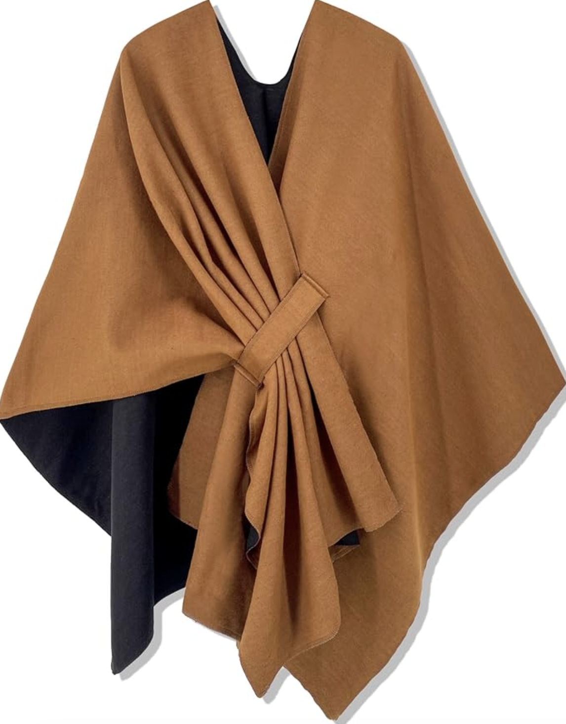 Close up of a woman wearing a camel-colored hooded knit cape with a large circular buckle, styled for a modern poetcore aesthetic.