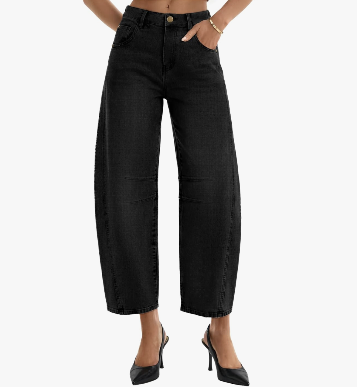 A close-up of a person wearing black wide-leg barrel jeans with a high-waisted fit and side pockets.