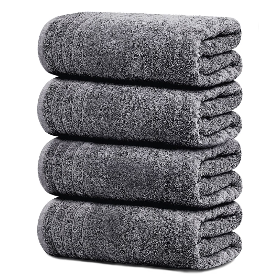Four dark-grey Tens Towels bath towels