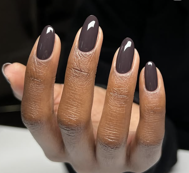 2026 nail trends: Charcoal gray nails as a soft, modern neutral alternative to black polish.