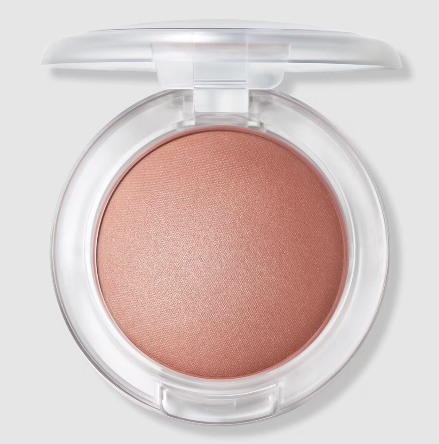 A top-down view of the MAC Glow Play Cushiony Blush in a dewy pink shade, used for the three-dot blush placement hack to naturally lift the face and create a fresh morning glow.