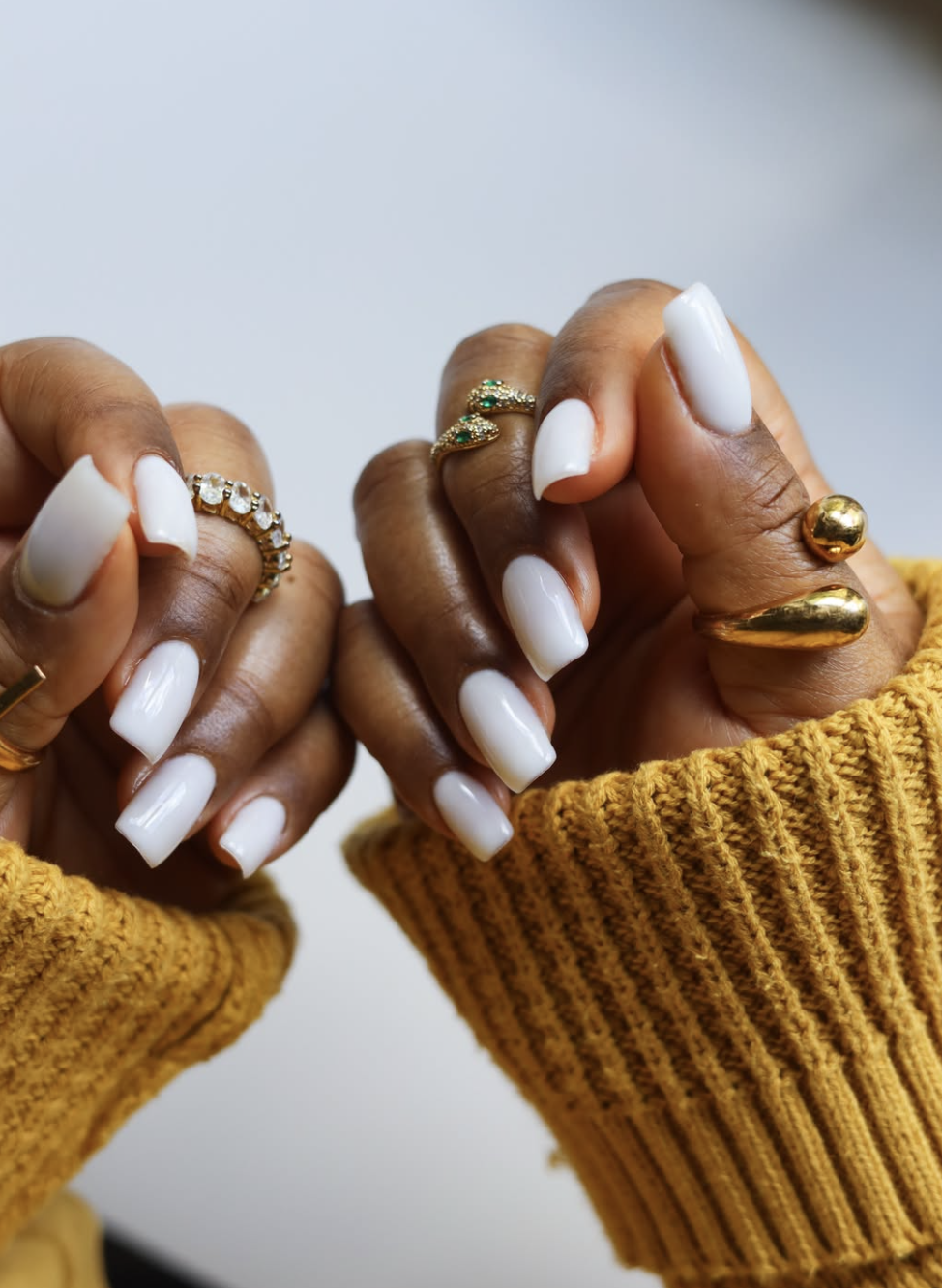 Short nails in coordinated stone, mushroom, cocoa, olive and charcoal shades.