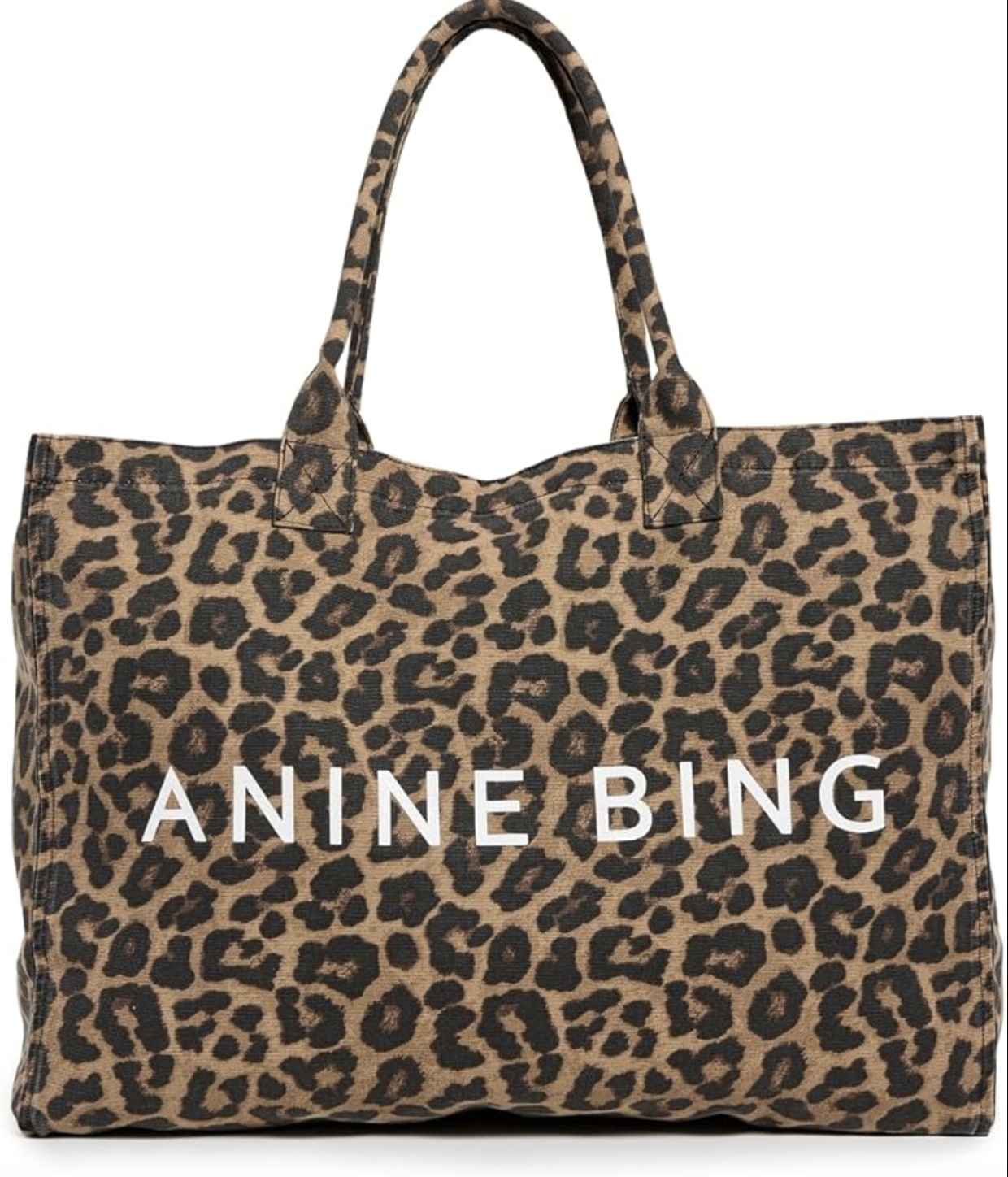 Oversized cotton canvas tote bag in a bold brown and black leopard print.