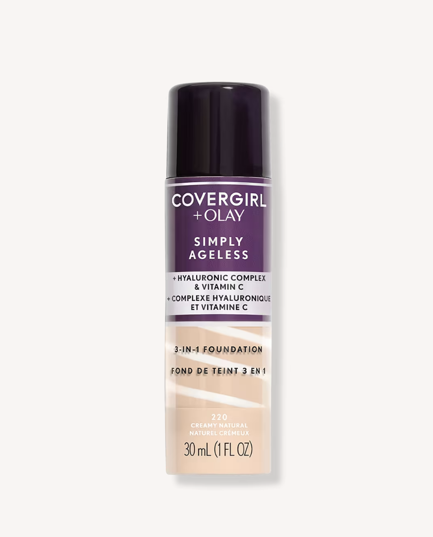 A front-facing product shot of a bottle of Covergirl and Olay Simply Ageless 3-in-1 Foundation in shade 220 Creamy Natural against a clean white background.