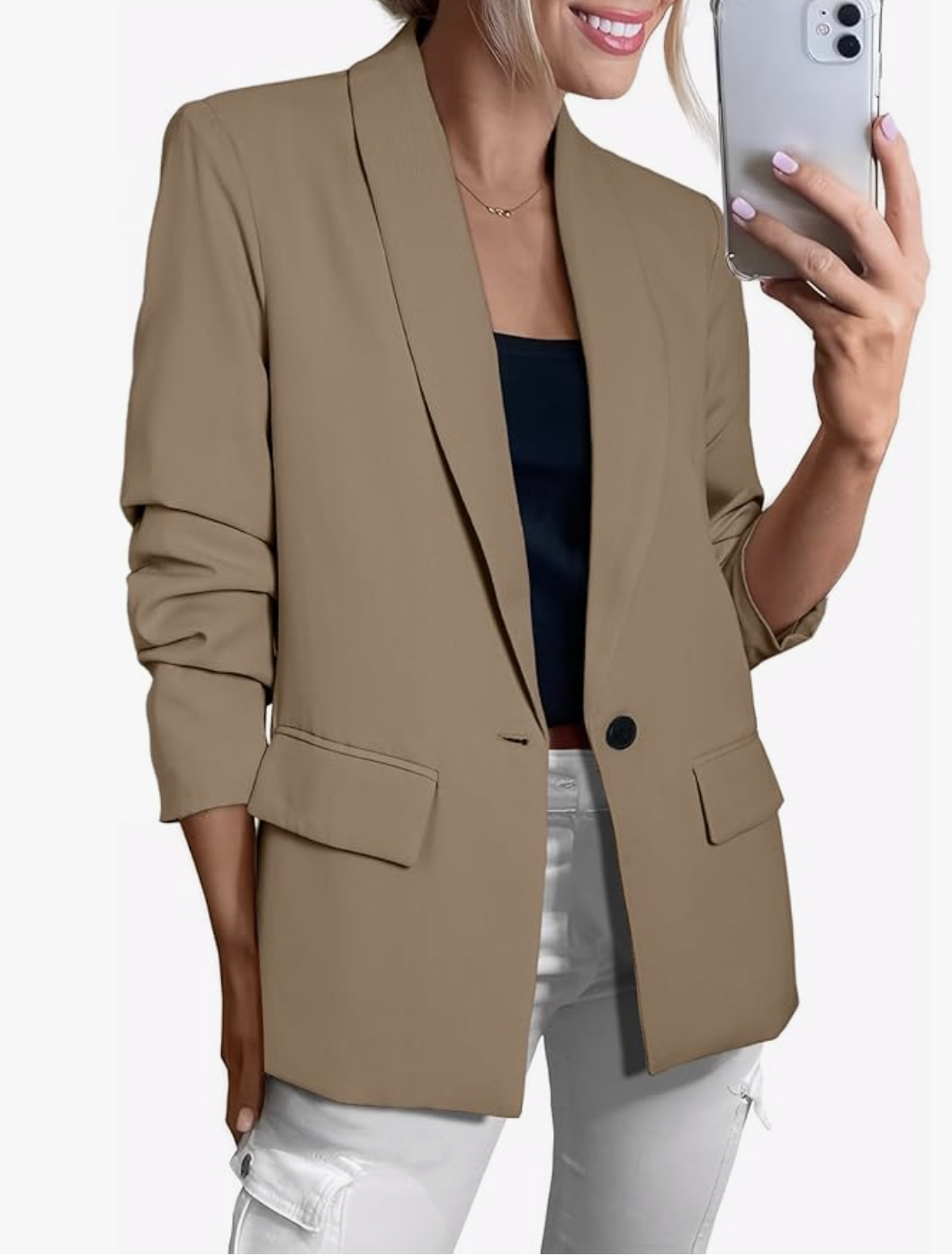 A studio product shot of a woman wearing a tan open-front blazer from Amazon, styled with white high-waisted cargo pants.
