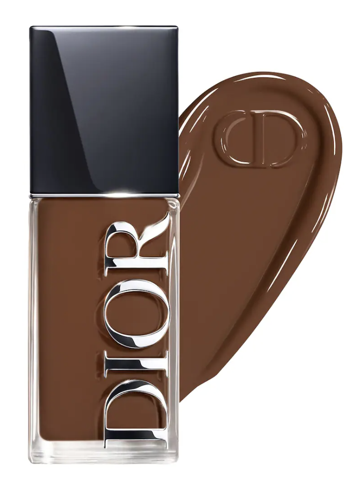 A bottle of Dior Forever Skin Glow Foundation in a deep rich shade alongside a smooth, liquid swatch of the product on a clean background.