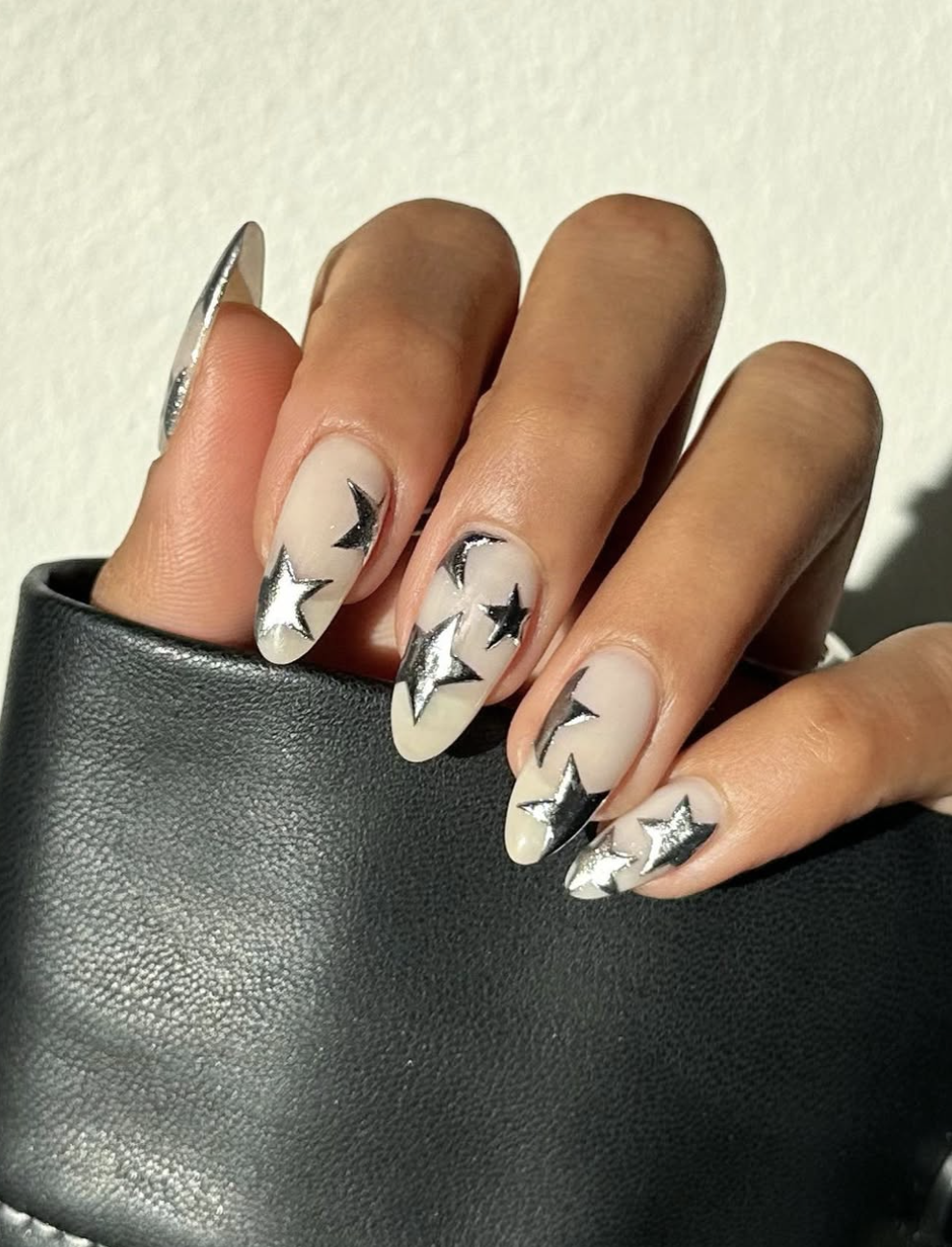 Cute simple star details for a back-to-school manicure