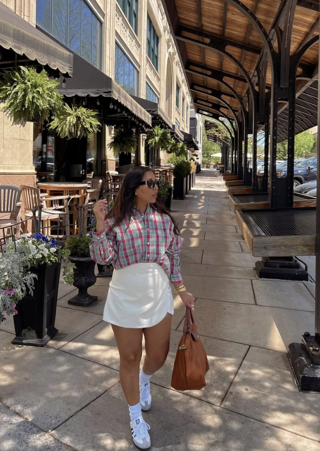 Full-length country concert outfit with plaid shirt leather skirt
