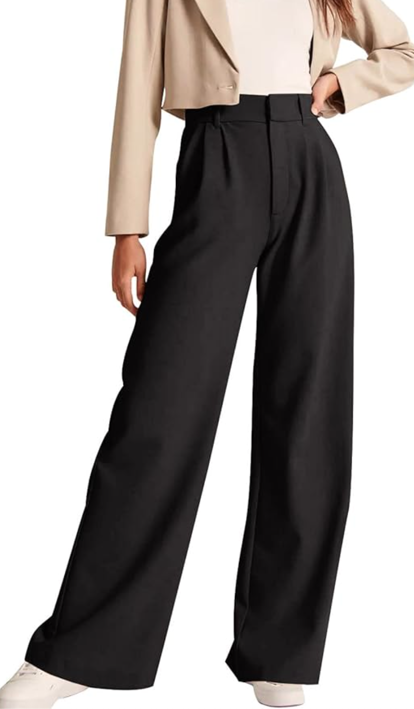 A woman wearing High Waisted Work Pants in black with a wide-leg silhouette and tailored front pleats, styled as an essential piece for a professional Amazon capsule wardrobe.