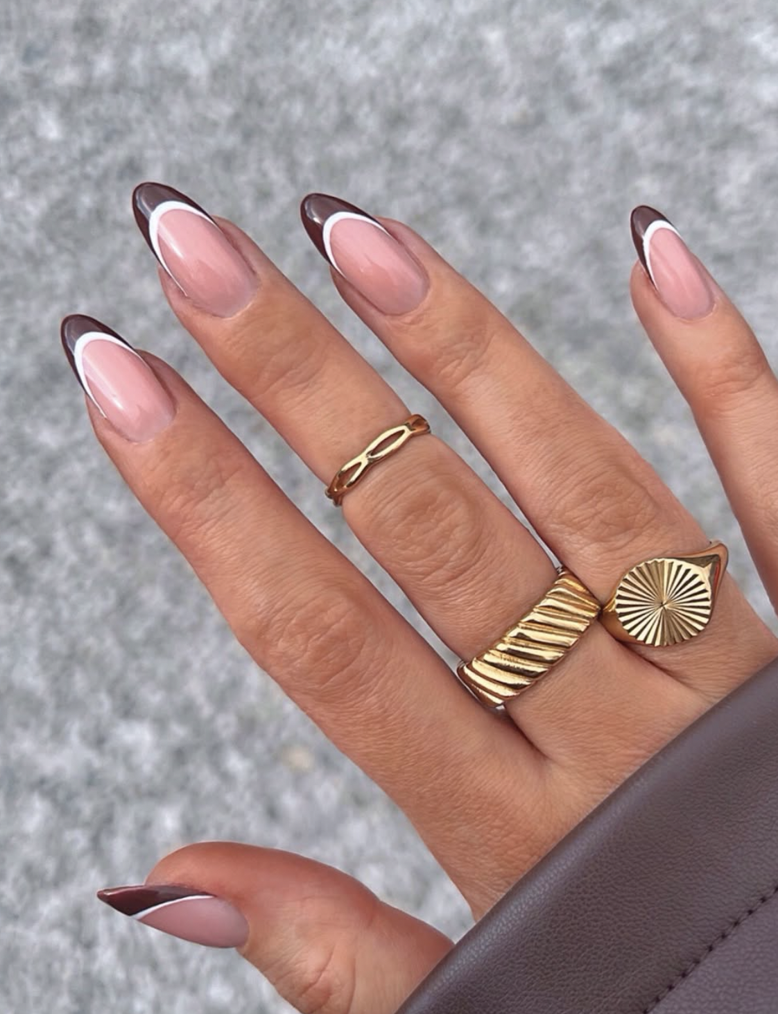 Cinnamon brown French tips on short almond nails