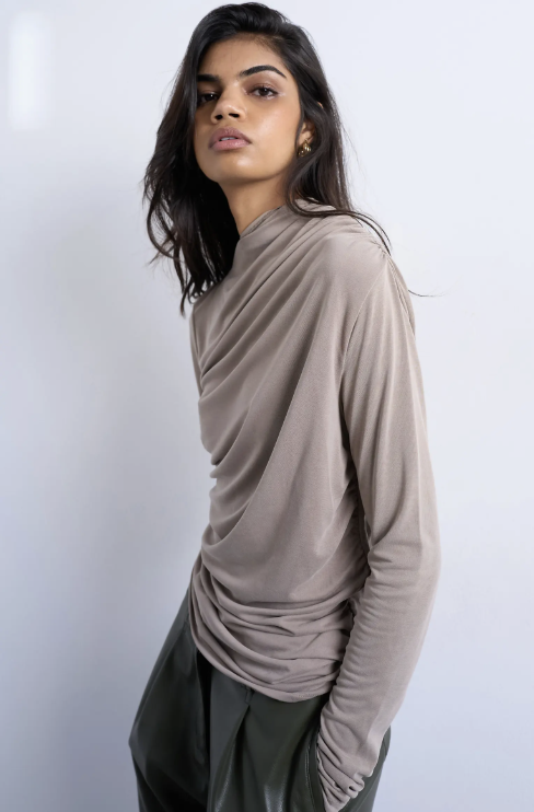 "Topshop Ruched Long Sleeve Top in a vibrant primary color, featuring a flattering ruched design for a modern classic wardrobe."