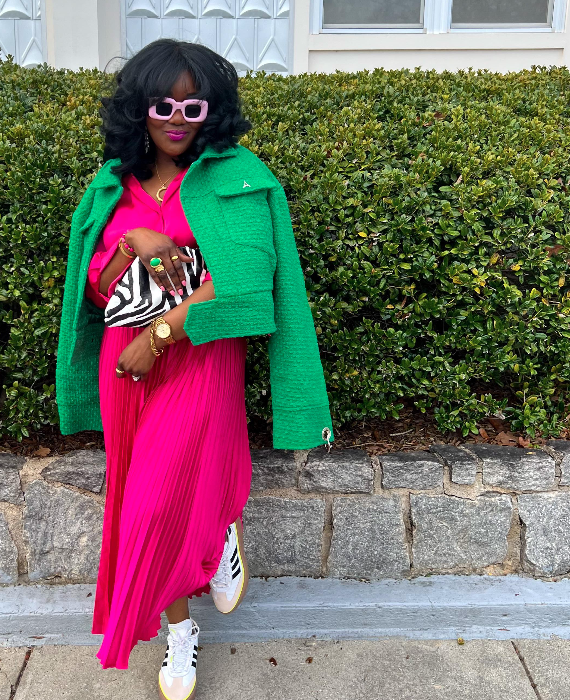 woman posing wearing a beautiful bold color blocking outfit