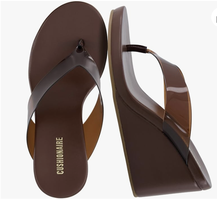 A pair of brown platform wedge thong sandals with a contoured comfort footbed.