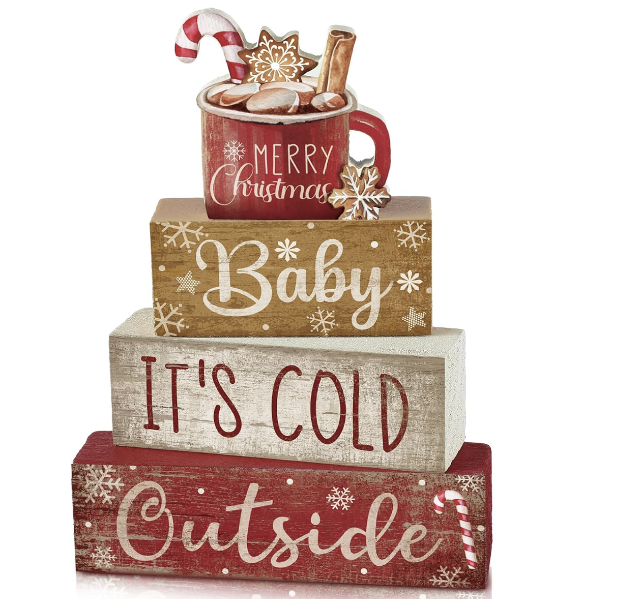 Stacked red, gold and cream wooden Christmas blocks reading Baby It's Cold Outside, topped with a Merry Christmas hot cocoa mug.