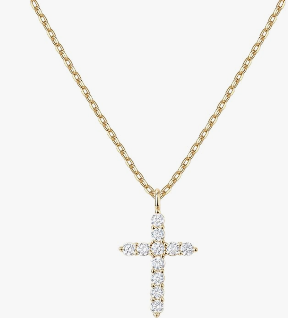 A gold-plated cubic zirconia cross necklace from Amazon, styled as a delicate accessory for a summer BBQ outfit.