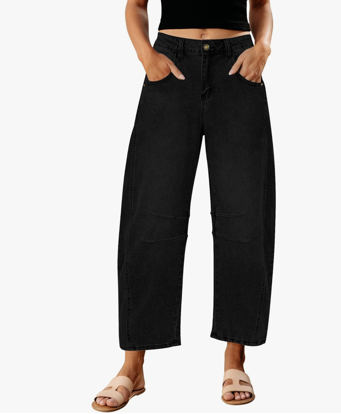 Fashion-forward barrel leg jeans with a tapered ankle, styled with sneakers for an effortless look.